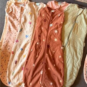 Ergo Pouch Sleep Sack Bundle (6-12m) 6 sleep sacks. 
1.0 TG & 2.5 TG